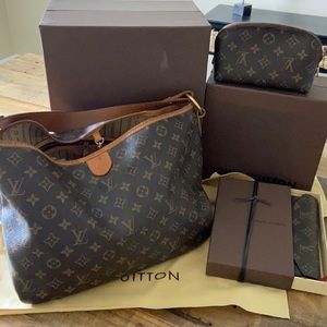Louis Vuitton Lg Handbag, makeup bag and wallet.